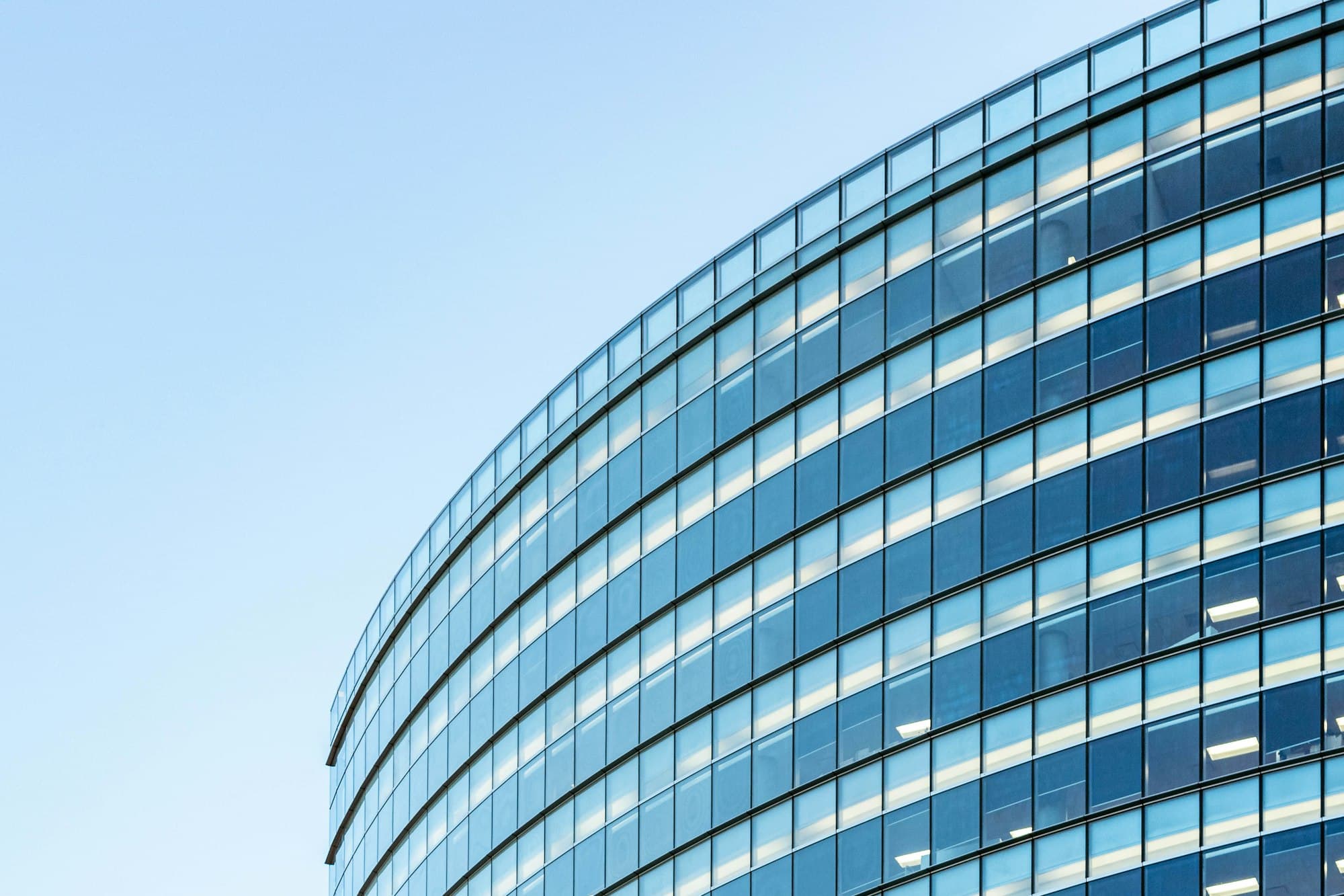 Modern office building with a curved glass facade