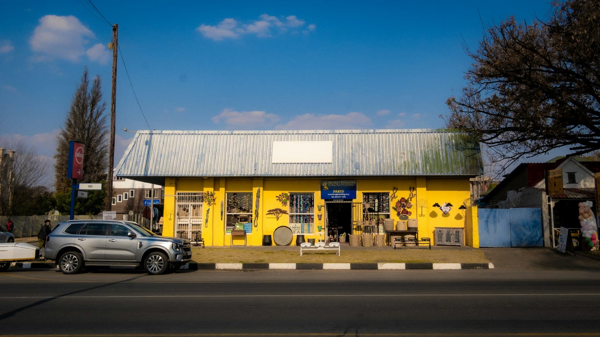 Brightly painted shop building on a Kenyan street